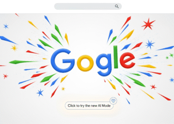 A vibrant, animated Google Doodle on the search homepage features Google’s letters bouncing together to form the iconic “G” logo, creating colorful sparkles. A subtle prompt invites users to click and explore the new AI Mode, symbolizing the fusion of playful visuals and groundbreaking AI technology reshaping how we search online.