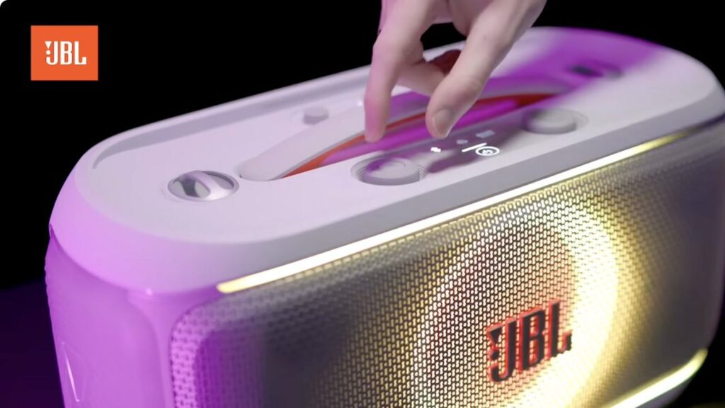 White JBL PartyBox On-The-Go 2 Plus illuminated during Kingy's filmed review
