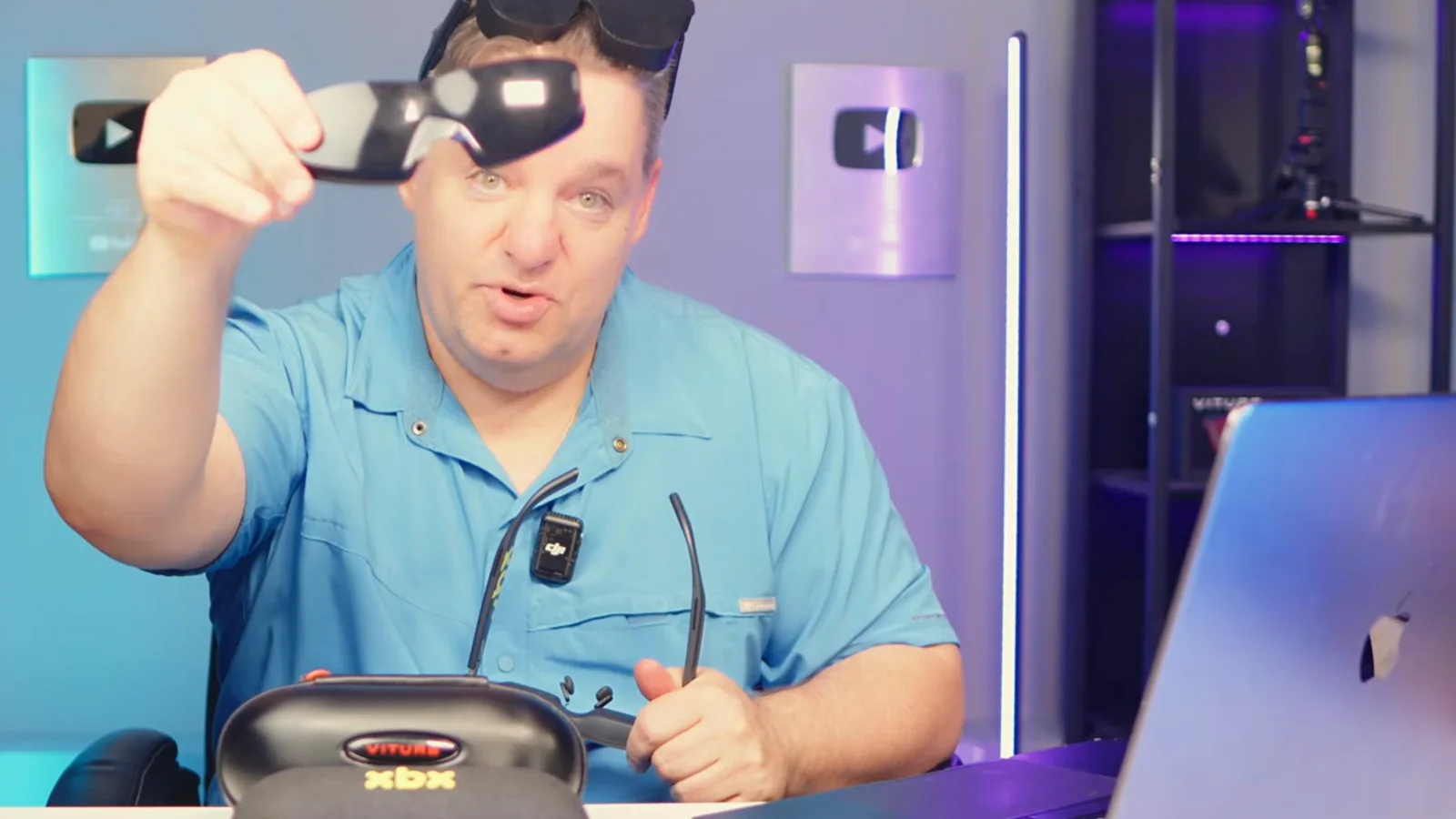 Curtis holding the removable light shield supplied with the XREAL xbx a01+